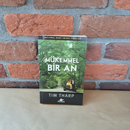 Mukemmel Bir An, Tim Tharp
